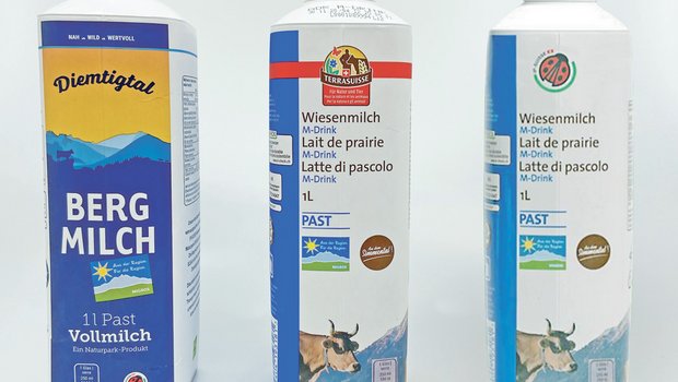 Die Bergmilch und die künftige Wiesenmilch mit Käfer (r.). In der Mitte die alte Packung mit Terra-Suisse-Logo. (Bild akr/Screenshot)